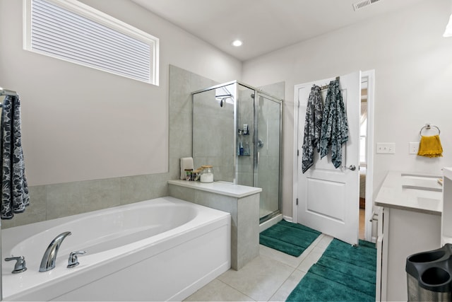 4051 Colfax Ct, Canton, MI 48188 - bathroom with a bath, a shower stall, tile patterned floors, and vanity
