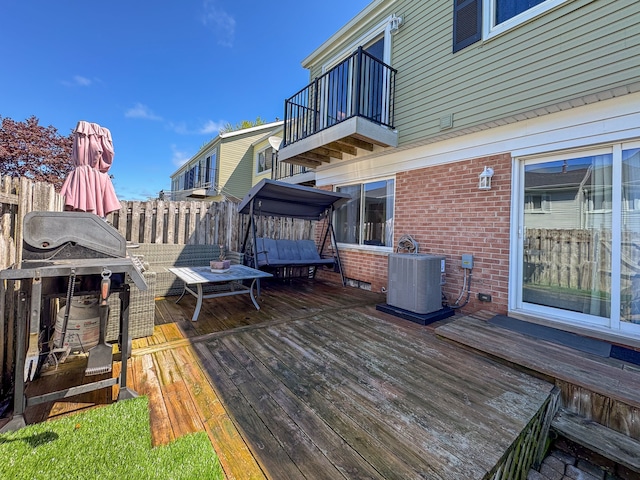 37475 Charter Oaks Blvd, Clinton Township, MI 48036 - wooden deck featuring central AC unit, area for grilling, and fence