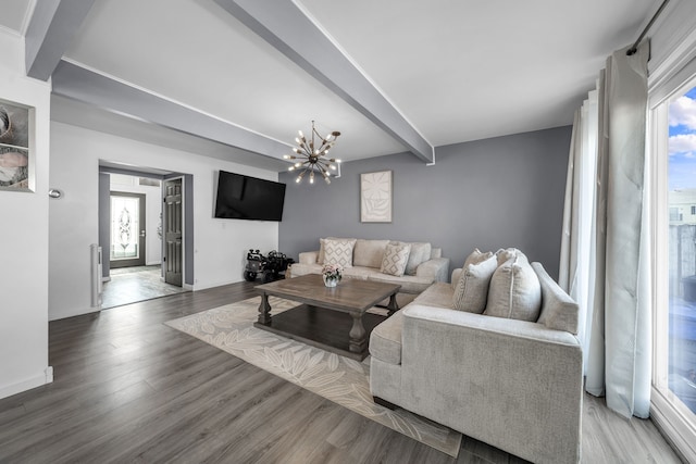 37475 Charter Oaks Blvd, Clinton Township, MI 48036 - living area featuring beam ceiling, wood finished floors, a chandelier, radiator heating unit, and baseboards