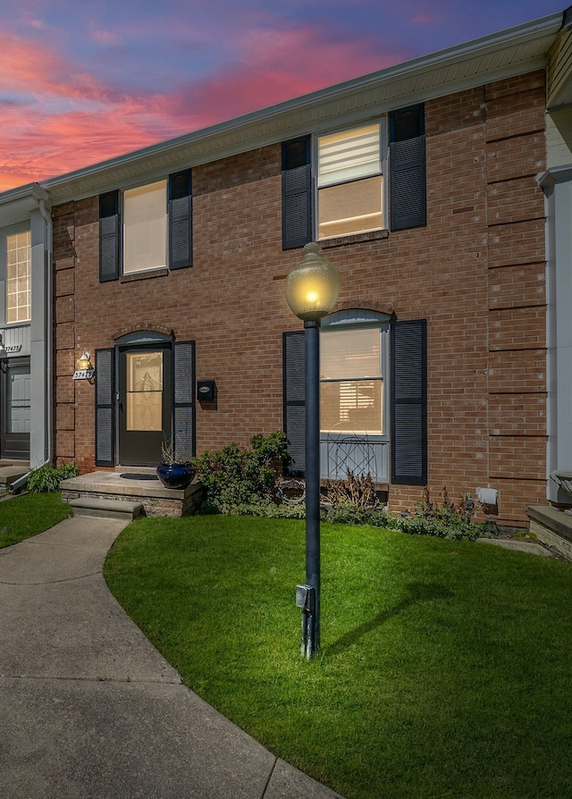 37475 Charter Oaks Blvd, Clinton Township, MI 48036 - townhome / multi-family property with a front yard and brick siding