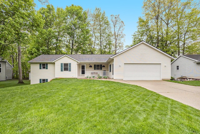 4754 Oaklane Dr, Hudsonville, MI 49426 - ranch-style home featuring covered porch, driveway, a garage, and a front yard
