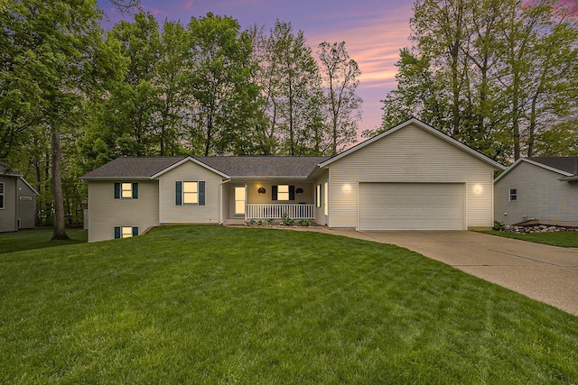 4754 Oaklane Dr, Hudsonville, MI 49426 - single story home featuring covered porch, driveway, a garage, and a front yard