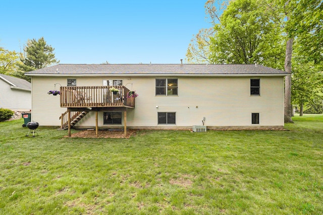 4754 Oaklane Dr, Hudsonville, MI 49426 - rear view of house featuring a wooden deck, a lawn, stairway, and central air condition unit