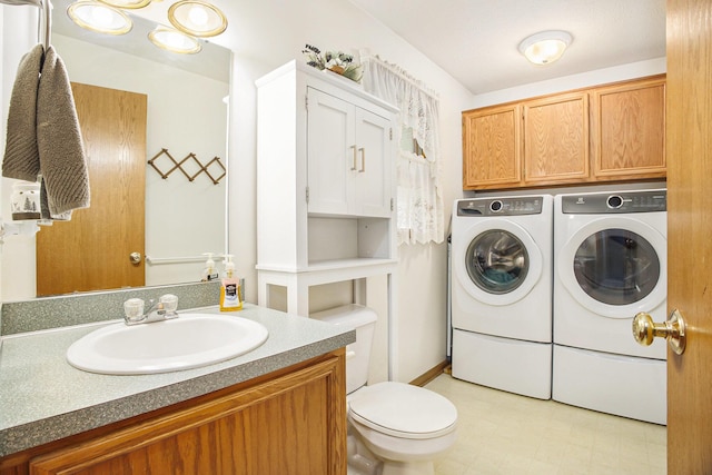 4754 Oaklane Dr, Hudsonville, MI 49426 - bathroom with independent washer and dryer, toilet, and vanity