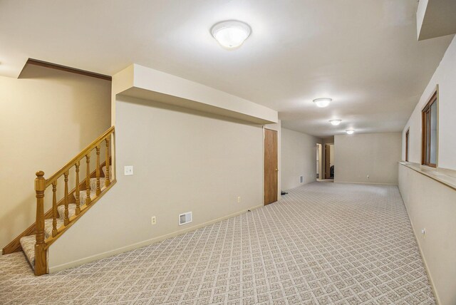 4754 Oaklane Dr, Hudsonville, MI 49426 - finished below grade area with stairway, carpet flooring, and baseboards