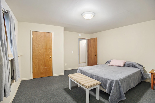 4754 Oaklane Dr, Hudsonville, MI 49426 - bedroom featuring dark colored carpet and baseboards
