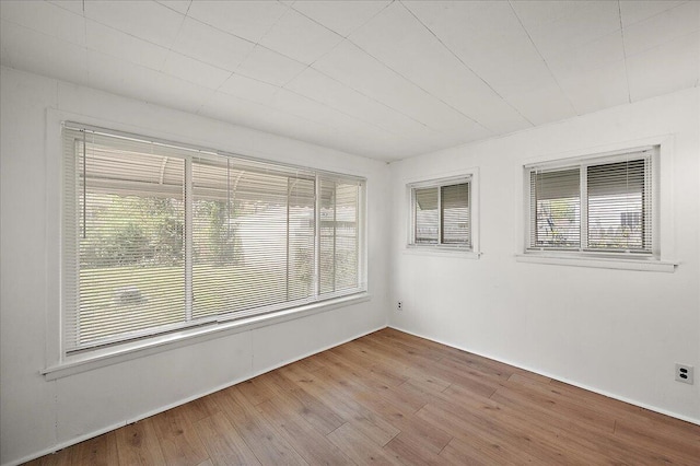5921 Hillcrest St, Grosse Pointe, MI 48236 - unfurnished room with plenty of natural light and wood finished floors