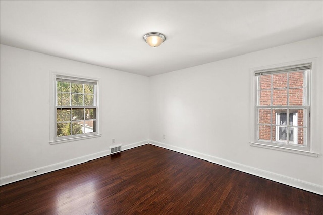 5921 Hillcrest St, Grosse Pointe, MI 48236 - unfurnished room featuring dark wood finished floors and baseboards