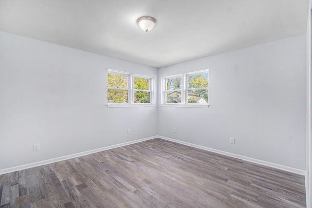 34641 Mound Rd, Sterling Heights, MI 48310 - empty room featuring wood finished floors and baseboards