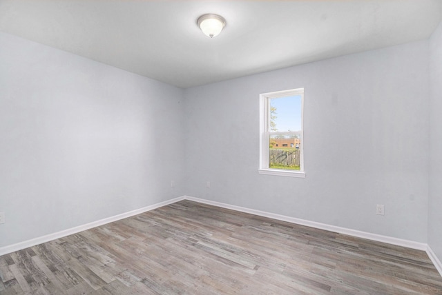 34641 Mound Rd, Sterling Heights, MI 48310 - unfurnished room with wood finished floors and baseboards