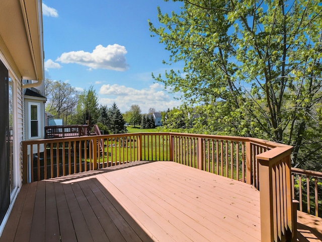 3201 Kilburn Park Cir, Ann Arbor, MI 48105 - wooden terrace featuring view of wooded area