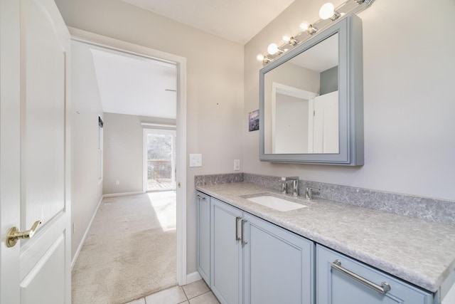 1972 Pine Ridge Dr, Manistee, MI 49660 - bathroom featuring vanity, tile patterned flooring, and baseboards