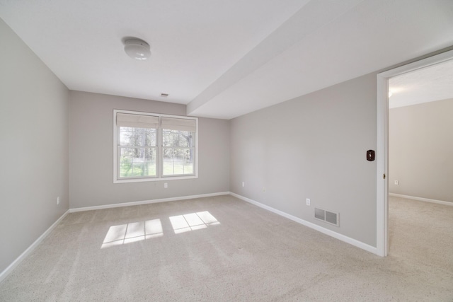 1972 Pine Ridge Dr, Manistee, MI 49660 - spare room featuring carpet floors and baseboards