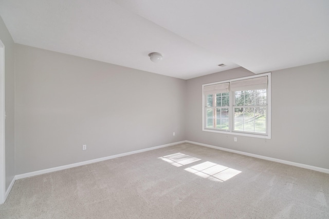 1972 Pine Ridge Dr, Manistee, MI 49660 - empty room featuring light carpet and baseboards
