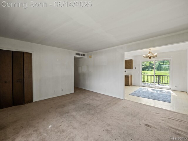 43667 Dequindre Rd, Troy, MI 48085 - unfurnished living room with a chandelier and carpet floors