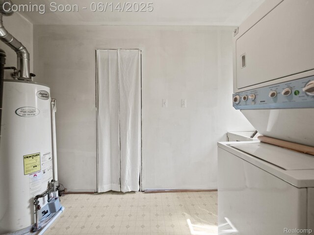 43667 Dequindre Rd, Troy, MI 48085 - washroom with stacked washer / drying machine, water heater, and light flooring