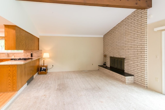 6279 Walker Ct, Troy, MI 48085 - unfurnished living room with lofted ceiling, carpet floors, a fireplace, and a sink