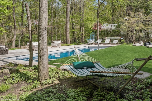 swimming pool featuring a patio area