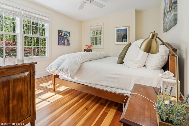 bedroom with wood finished floors and ceiling fan