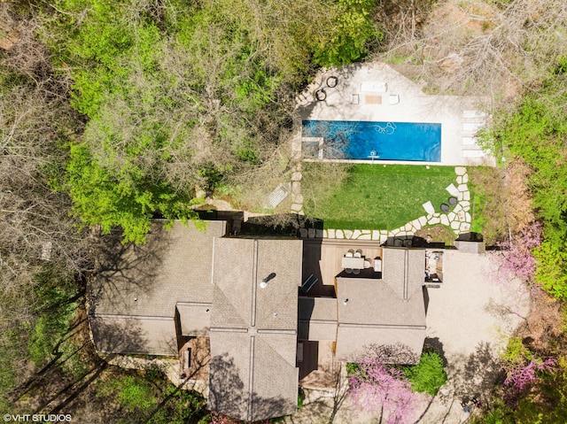 view of subject property featuring a pool