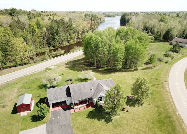4930 Warrington Way, Gladwin, MI 48624 - aerial view of property and surrounding area with a large body of water and a heavily wooded area