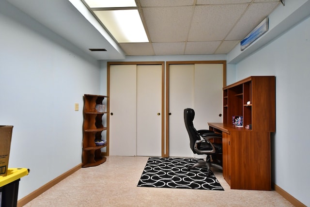 4930 Warrington Way, Gladwin, MI 48624 - home office featuring a paneled ceiling and baseboards