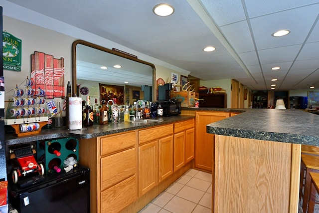 4930 Warrington Way, Gladwin, MI 48624 - indoor wet bar with recessed lighting and light tile patterned flooring