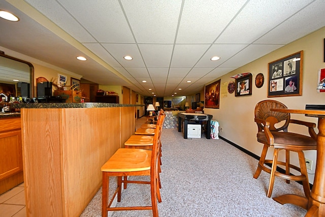 4930 Warrington Way, Gladwin, MI 48624 - indoor wet bar with a drop ceiling, light carpet, recessed lighting, and baseboards