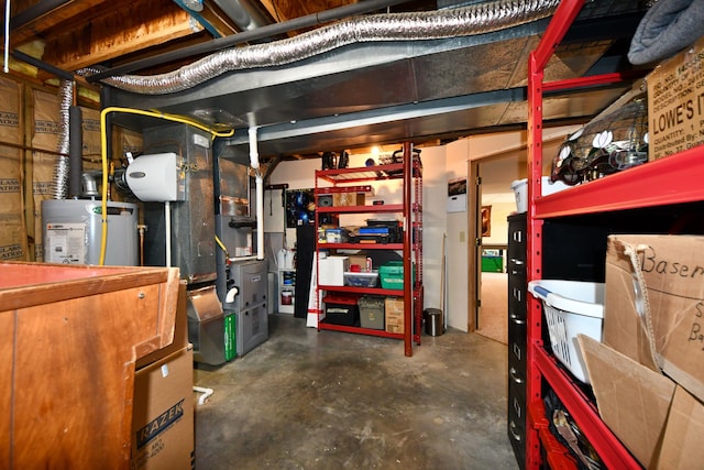 4930 Warrington Way, Gladwin, MI 48624 - unfinished basement featuring strapped water heater and heating unit