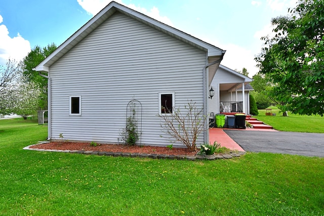 4930 Warrington Way, Gladwin, MI 48624 - view of property exterior featuring a yard