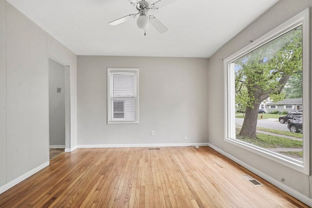 1631 Channing St, Ferndale, MI 48220 - spare room featuring wood-type flooring, a ceiling fan, and baseboards
