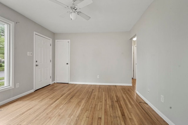 1631 Channing St, Ferndale, MI 48220 - spare room with light wood-style floors, baseboards, and a ceiling fan