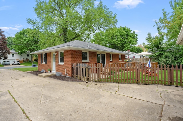 view of front of property featuring brick siding