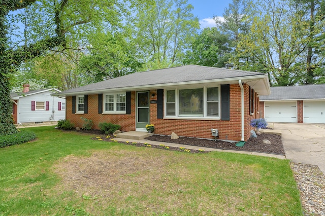 ranch-style home featuring brick siding, a front yard, and driveway