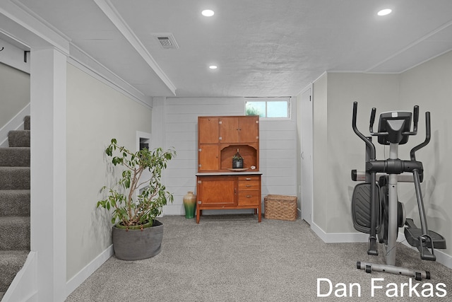 exercise area with baseboards, recessed lighting, and carpet flooring