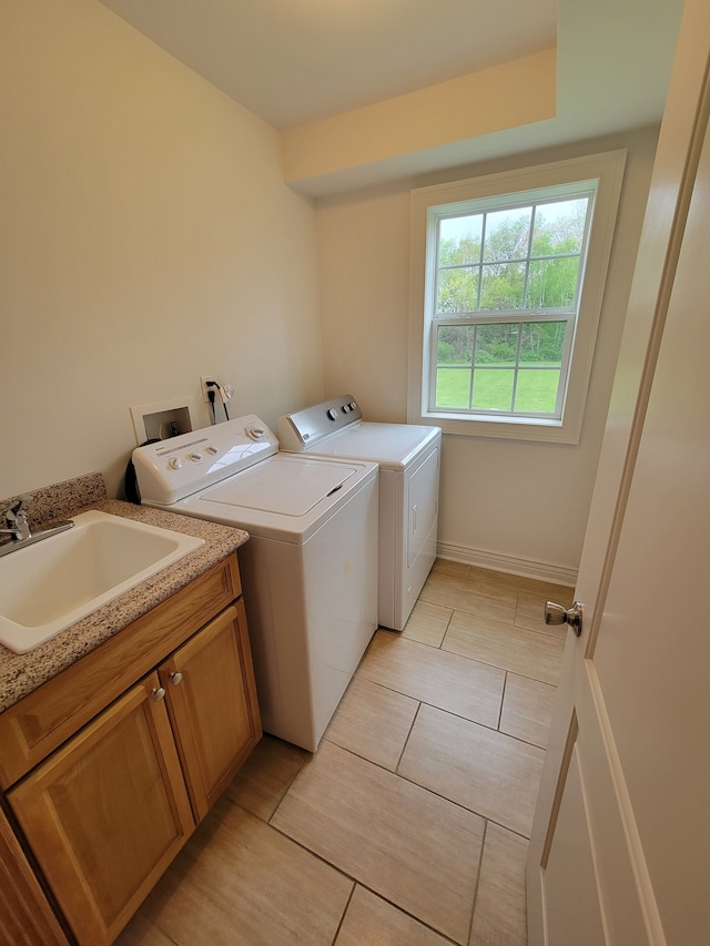 10726 Davisburg Rd, Davisburg, MI 48350 - washroom with washing machine and clothes dryer and cabinet space