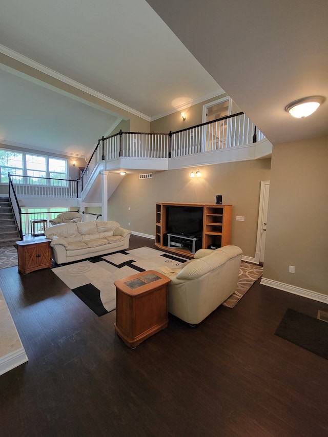 10726 Davisburg Rd, Davisburg, MI 48350 - living room with stairs, wood finished floors, baseboards, ornamental molding, and vaulted ceiling