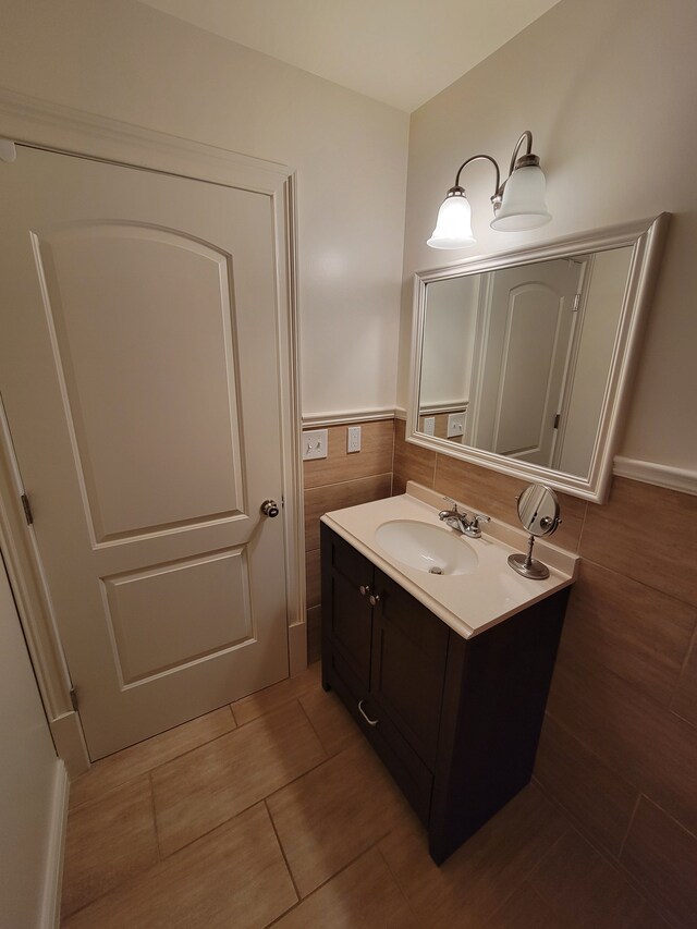 10726 Davisburg Rd, Davisburg, MI 48350 - bathroom with vanity and tile walls