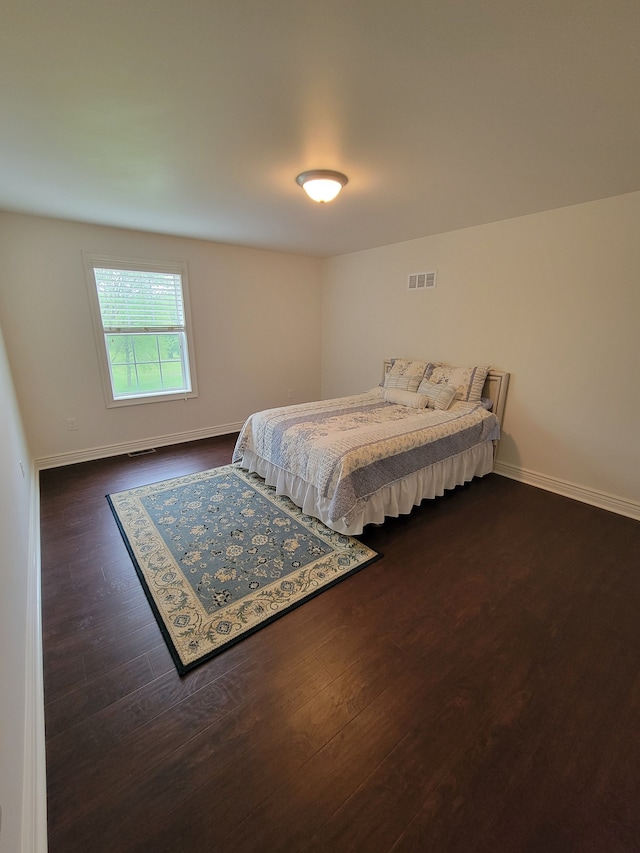 10726 Davisburg Rd, Davisburg, MI 48350 - bedroom with dark wood-style floors and baseboards