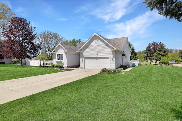 view of front of house with concrete driveway, an attached garage, and roof with shingles