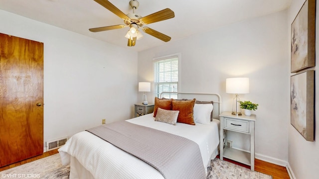 1200 Mohawk Ln, Saint Joseph, MI 49085 - bedroom featuring light wood-style flooring, baseboards, and a ceiling fan