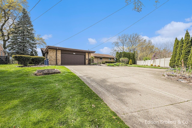 1657 W Kentview Dr NE, Grand Rapids, MI 49505 - view of front of home featuring brick siding and a garage