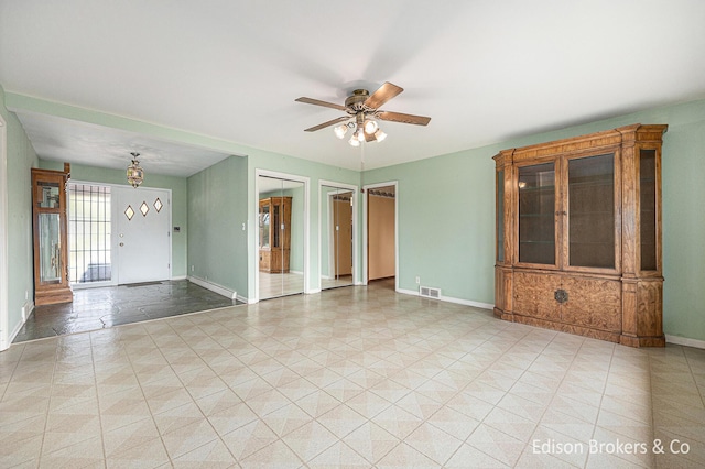 1657 W Kentview Dr NE, Grand Rapids, MI 49505 - empty room with ceiling fan and baseboards