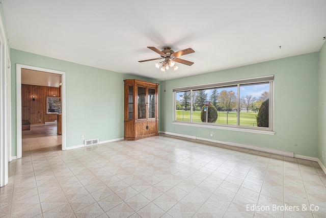1657 W Kentview Dr NE, Grand Rapids, MI 49505 - spare room with ceiling fan and baseboards