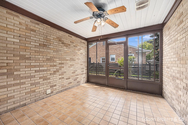 1657 W Kentview Dr NE, Grand Rapids, MI 49505 - unfurnished sunroom featuring a ceiling fan