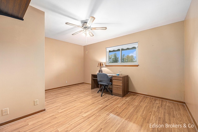 1657 W Kentview Dr NE, Grand Rapids, MI 49505 - office area with ceiling fan, wood finished floors, and baseboards