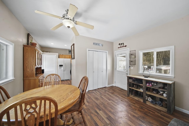 443 S Jackson St, Hanover, MI 49241 - dining area featuring dark wood-style floors, a ceiling fan, and baseboards