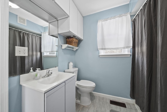 443 S Jackson St, Hanover, MI 49241 - full bath with toilet, baseboards, and vanity