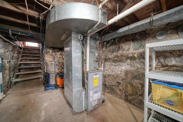 443 S Jackson St, Hanover, MI 49241 - unfinished basement with stairway and heating unit