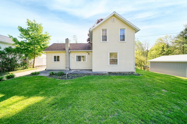 443 S Jackson St, Hanover, MI 49241 - rear view of house with a yard and a chimney